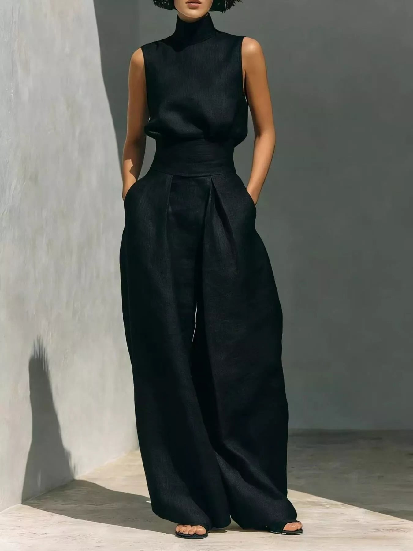 Trendsi sleeveless turtleneck top and wide-leg pants set, stylish and comfortable clothing ensemble for women.