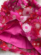 Floral embroidered tie waist mini dress by Trendsi featuring an elegant summer A-line silhouette and colorful floral embroidery.