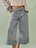 Wide-leg cropped denim jeans by Plush Fashion Shop, featuring a relaxed fit and stylish design, shown on a model.