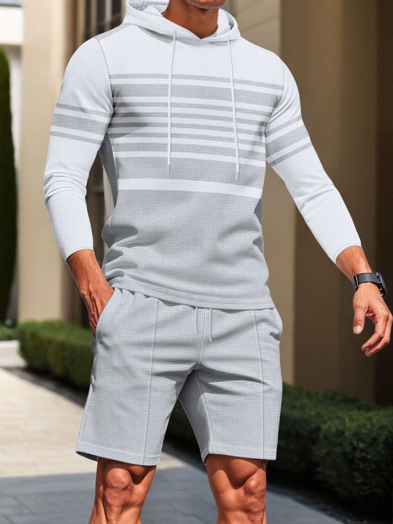 Men's full size striped hoodie and shorts casual set by Trendsi, featuring a comfortable hoodie with bold stripes and matching shorts.
