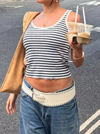 Striped scoop neck tank top by Trendsi featuring horizontal black and white stripes and a relaxed fit.