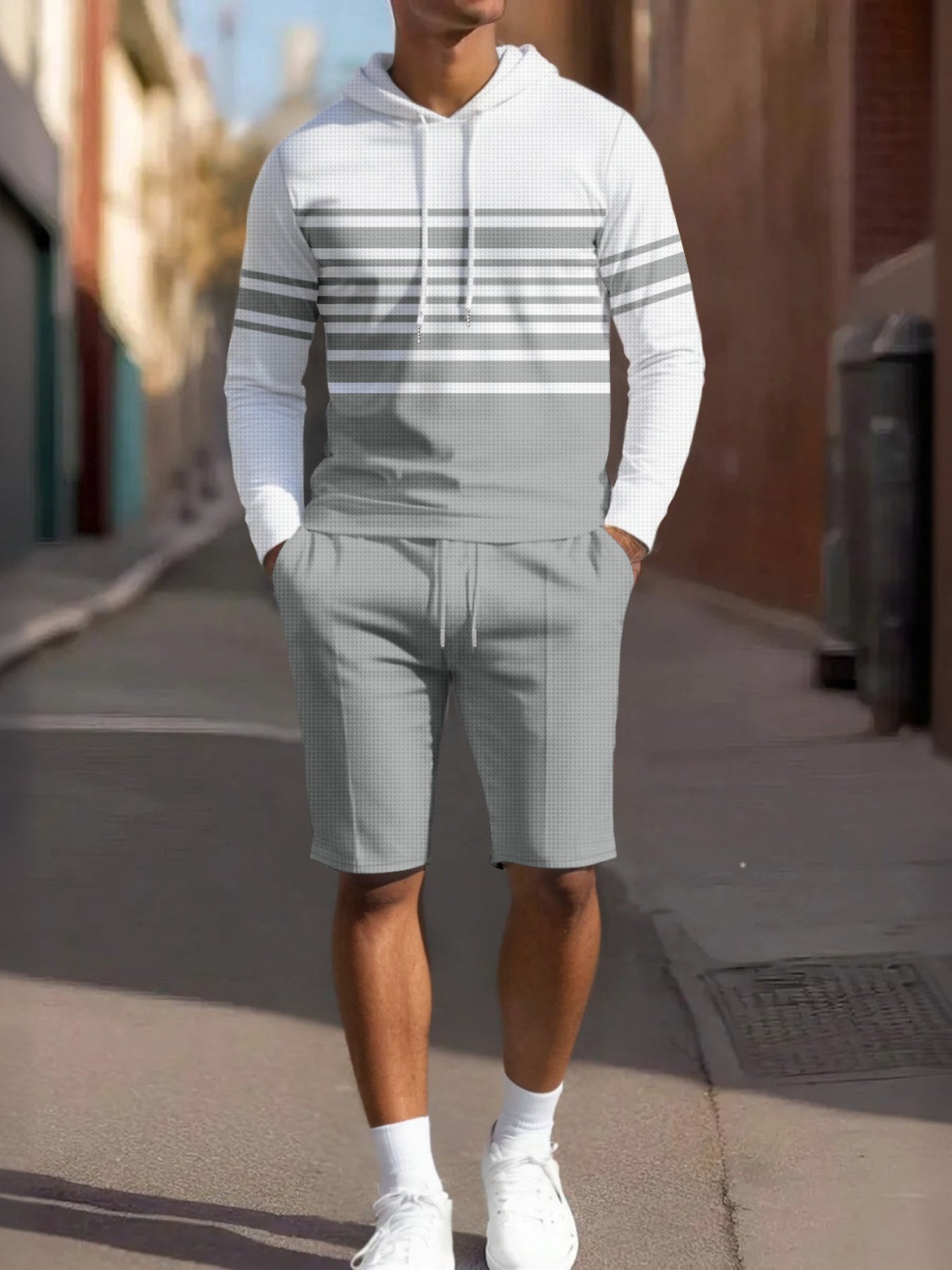 Men's plus size striped hoodie and shorts casual set by Trendsi, featuring a comfortable hoodie with bold stripes and matching shorts.