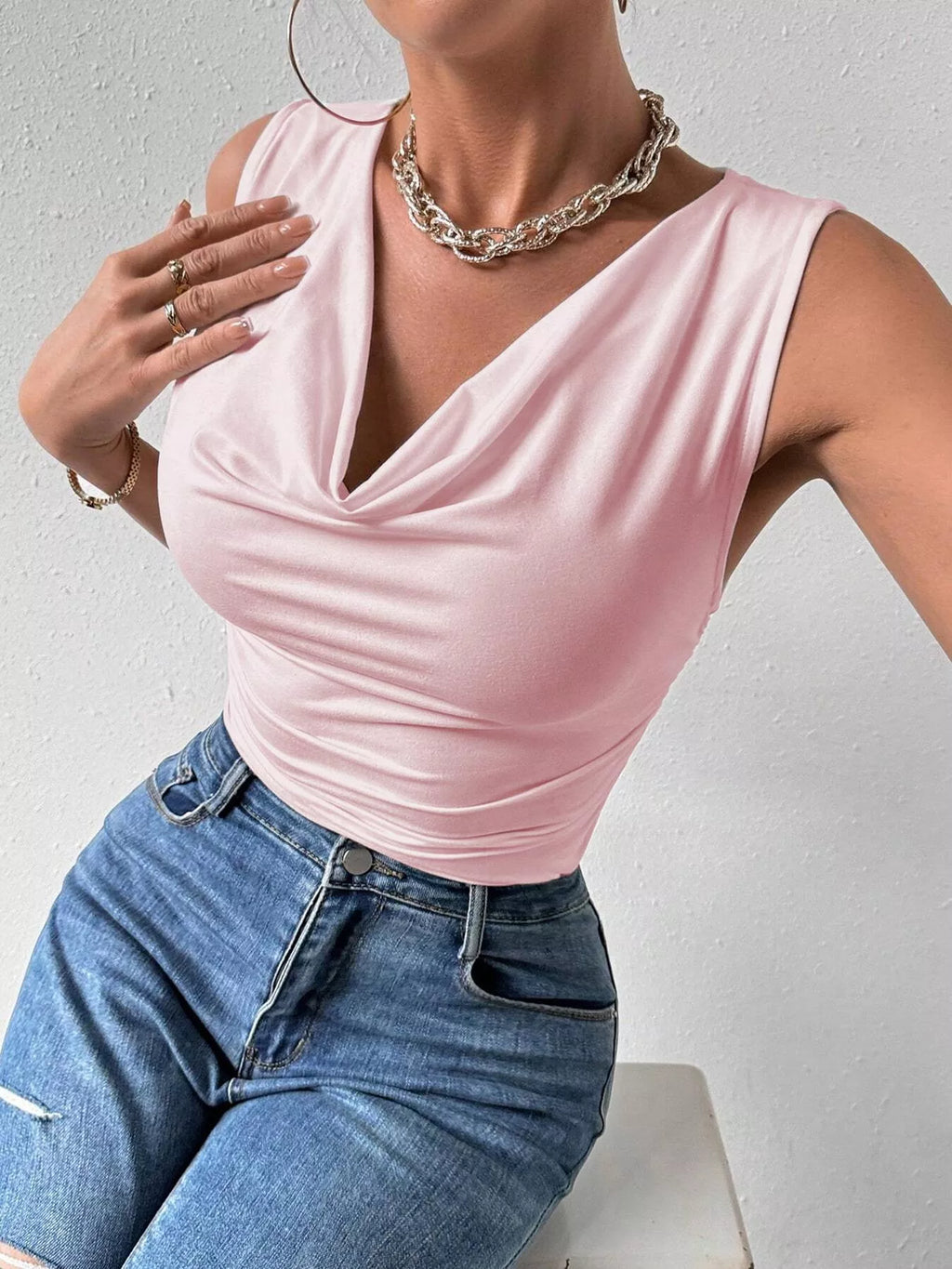 Trendsi cowl neck tank top in soft fabric, featuring a relaxed fit and sleeveless design for casual or layered outfits.