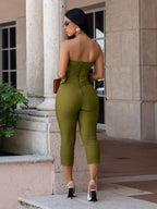 Black belted tube skinny jumpsuit from Trendsi featuring a fitted silhouette and sleek design.