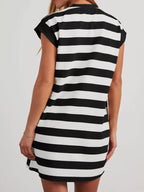 Plus size casual striped short sleeve mini dress by Trendsi, full-length view showcasing relaxed fit and vibrant pattern.