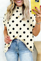 Polka dot print high neck dolman top from Trendsi featuring long sleeves and a relaxed fit.
