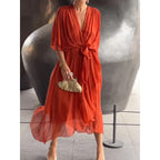 Plush Fashion Hub batwing sleeve V-neck midi dress with tied irregular hem, feminine fairy style, lightweight and elegant.