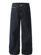 Men's wide-leg denim jeans by Plush Fashion Shop, featuring classic blue fabric and relaxed fit style.