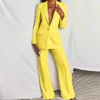 Women's professional blazer and trousers suit set by FitiqueFit, featuring a long sleeve blazer and full-length trousers.