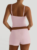 Trendsi V-neck cami and shorts active wear set in soft fabric, featuring a comfortable V-neck top and matching shorts.
