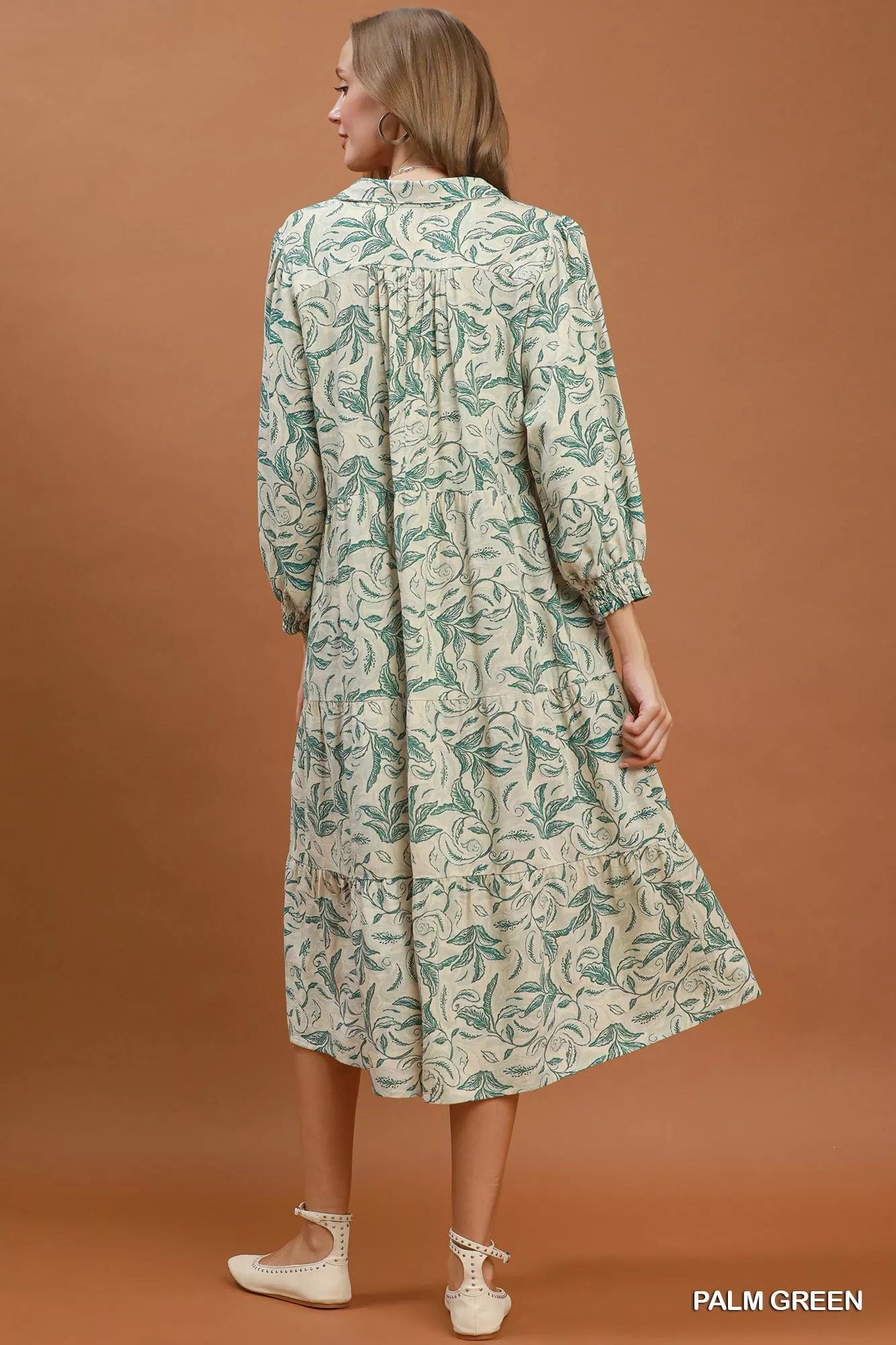 Linen botanical print tiered midi dress by Umgee featuring a relaxed fit and tiered design, perfect for casual summer wear.