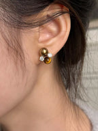 Tiger Eye stud earrings by Trendsi featuring polished gemstone studs with a warm, golden-brown hue and sleek metal posts