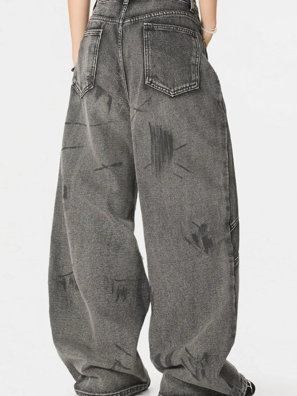 Men's wide-leg denim jeans from Plush Fashion Shop, showing the relaxed fit and classic blue denim fabric.