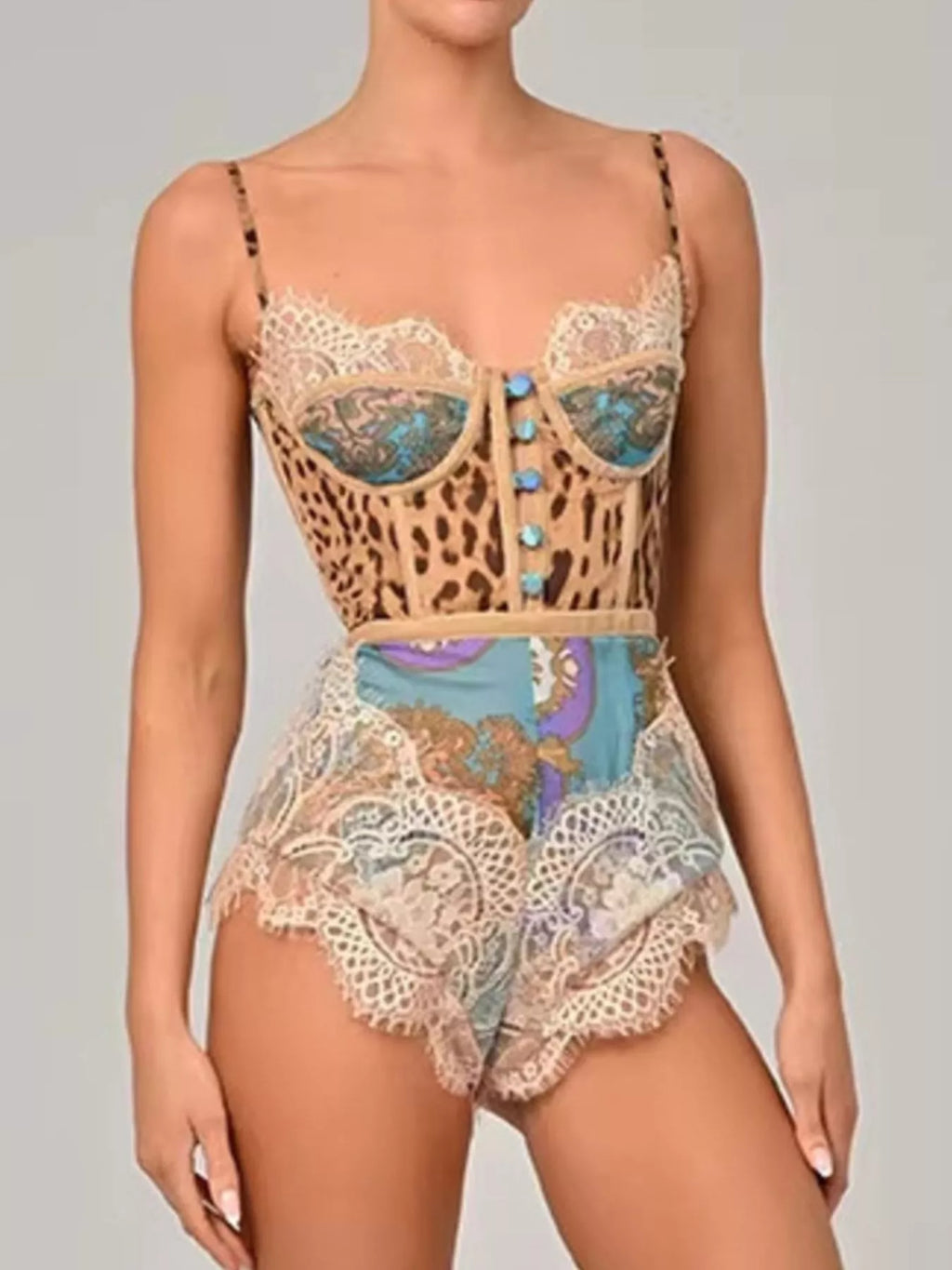 Leopard print lace trim romper from Trendsi, featuring a stylish sleeveless design with a fitted waist and playful animal print.