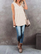 V-neck waffle knit tank top with contrast stitching from Trendsi, featuring a fitted sleeveless design and textured fabric.