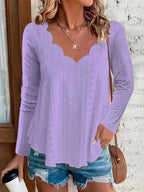 Elegant women's eyelet long sleeve blouse by Trendsi featuring a stretchy, versatile office top design with intricate eyelet details.