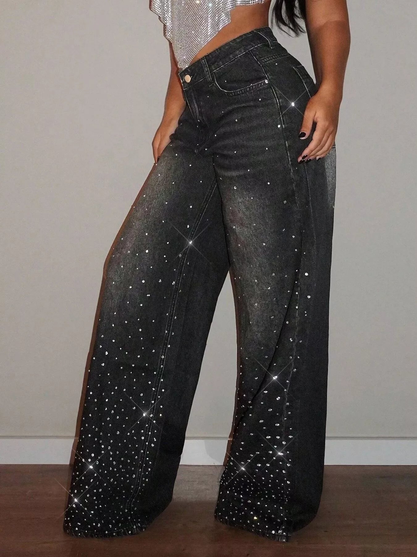 Rhinestone wide-leg jeans by Trendsi featuring embroidered rhinestones on denim with a relaxed fit and high waist.
