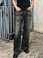Men's vintage washed frayed hem jeans from Trendsi, showcasing distressed denim with a relaxed fit and frayed cuffs.