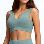 Women's seamless ribbed built-in bra tank top from Plush Fashion Hub, featuring a longline design and fitted activewear silhouette.