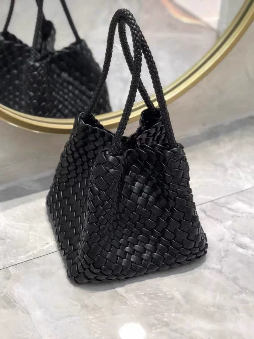 Hand-pressed woven tote bag from Plush Fashion Hub with sturdy handles and intricate woven design, perfect for casual outings.