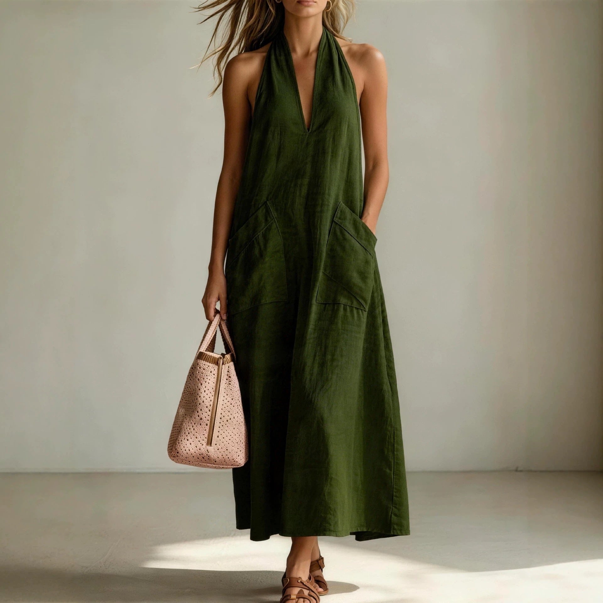 Cotton halterneck sleeveless dress by FitiqueFit featuring a deep V-neck and loose straight-line casualwear style.