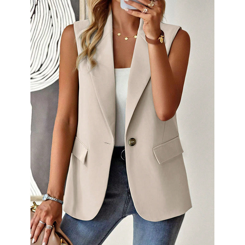 Beige sleeveless blazer vest with notched lapels, one-button closure, and side flap pockets worn over a white top.