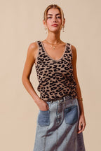 Women's leopard print lightweight V-neck knitted tank top by Trendsi, featuring a stylish leopard pattern and sleeveless design.