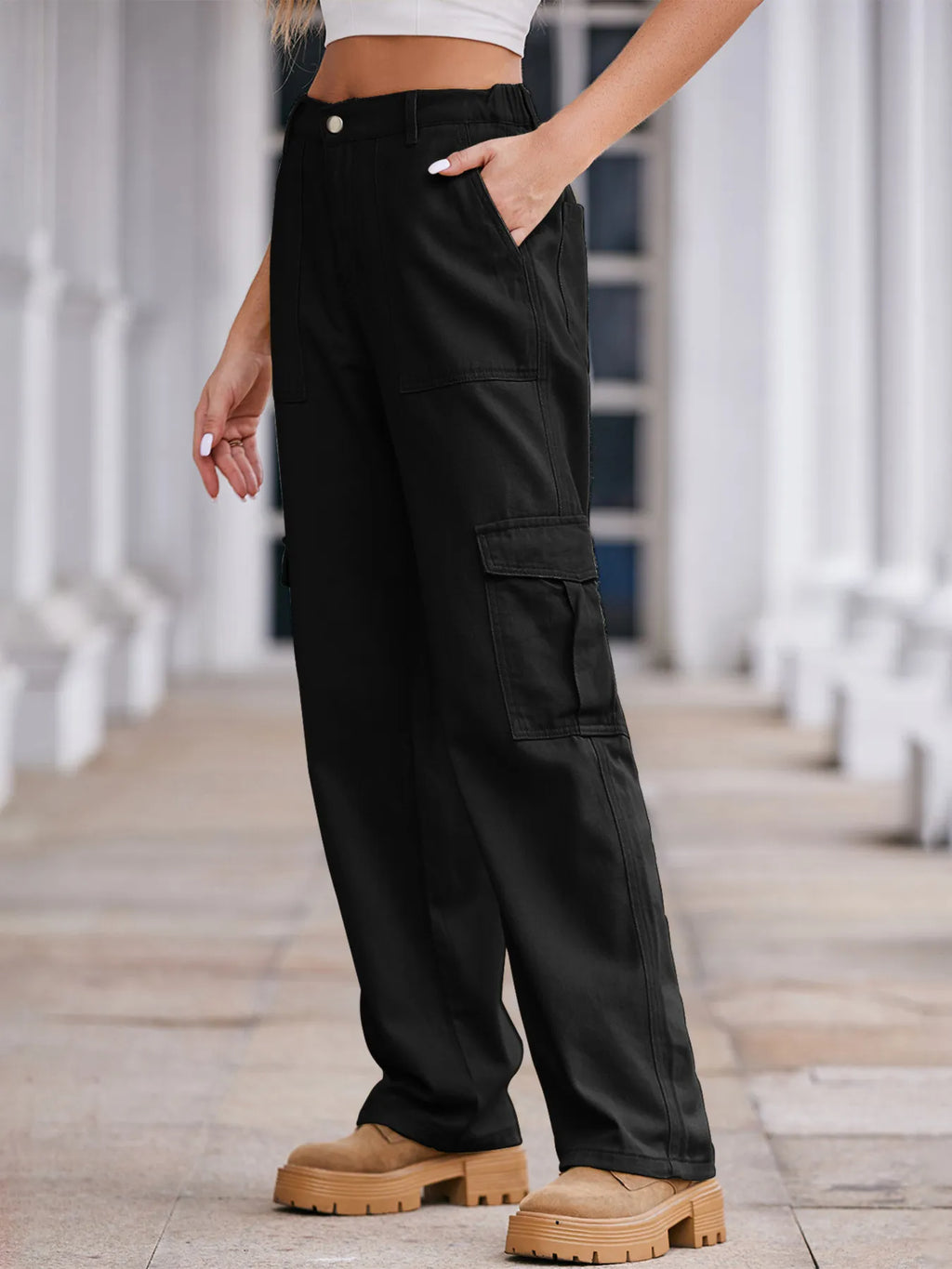 High-waisted plush denim cargo jeans with multiple pockets, styled for a casual, trendy look.