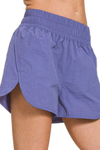 Zenana active wear windbreaker running shorts with smocked waistband, lightweight fabric, and sporty design for outdoor activities.