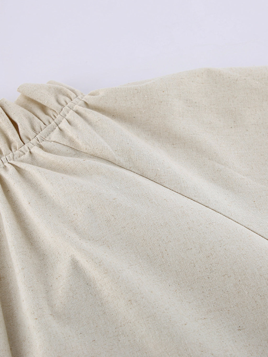 Cotton linen maxi dress with tie neck and flounce sleeves, trendy dress from Trendsi featuring a flowing silhouette and relaxed fit.