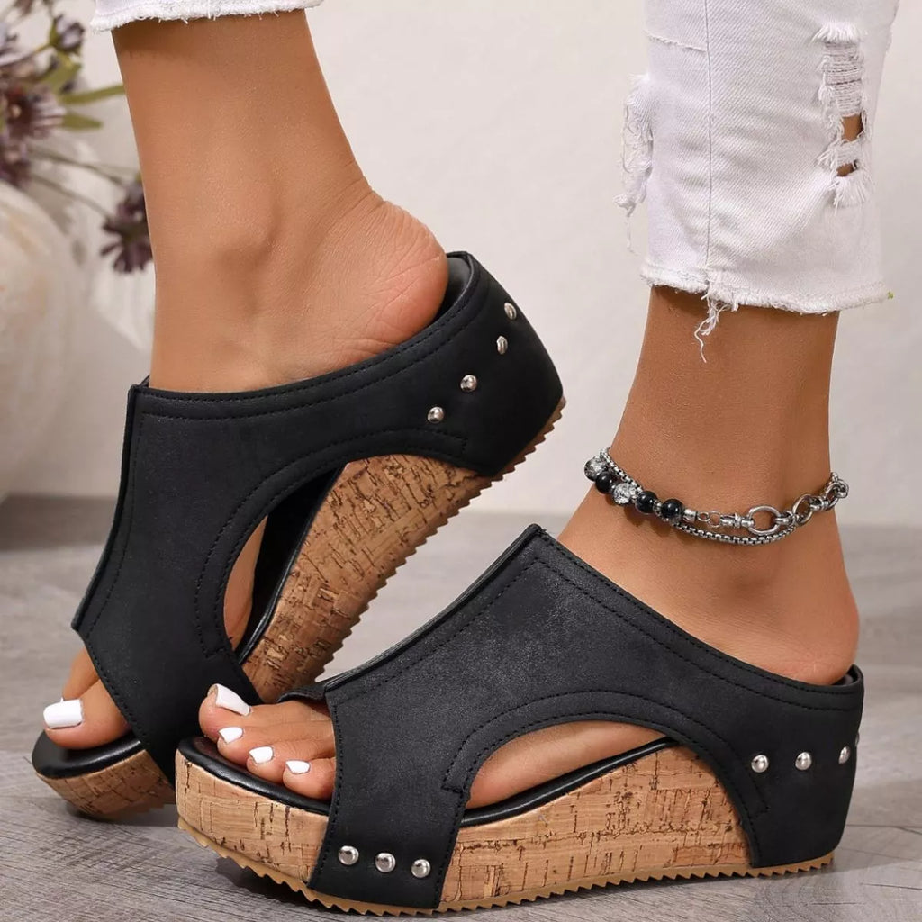 Open toe wedge sandals by Plush Fashion Hub featuring a stylish design with a comfortable platform and ankle straps.