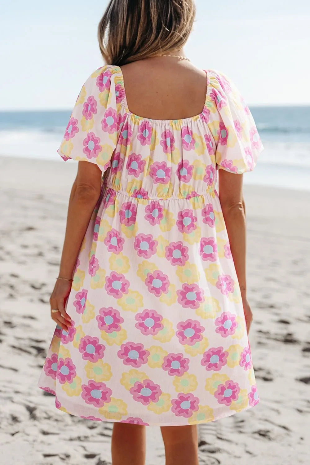 Floral square neck puff sleeve cotton midi dress with pleated flared design, stylish and feminine from Trendsi.