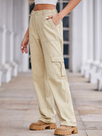 High-waisted cargo denim jeans from Plush Fashion Shop, showing front view with functional side pockets and relaxed fit.