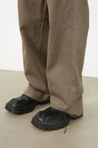 Men's baggy jeans with multiple pockets by Trendsi, showing relaxed fit and casual style in a denim fabric.