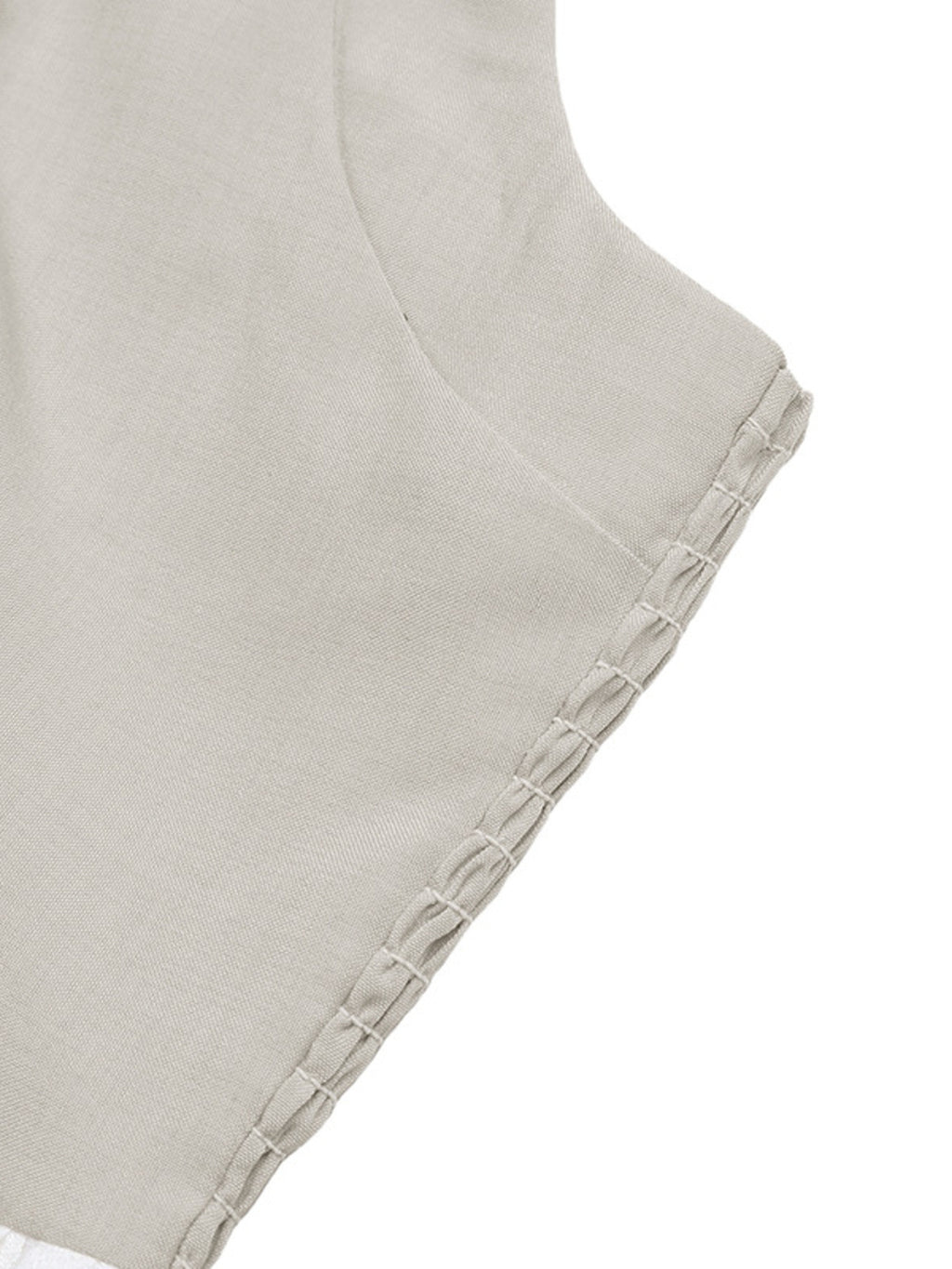 Elegant two-tone halter neck maxi dress with ruched details and side pockets, perfect for stylish occasions.