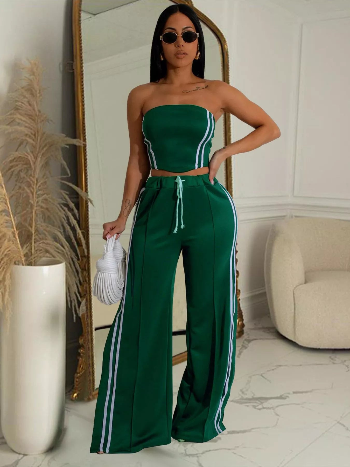 Trendsi sleeveless tube top and wide-leg pants set on a hanger, showing the stylish matching summer outfit.