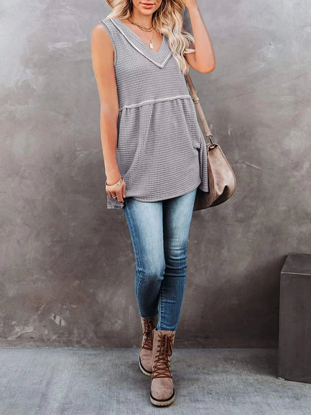 V-neck waffle knit tank top with contrast stitching, casual sleeveless top from Trendsi, shown in a neutral color.