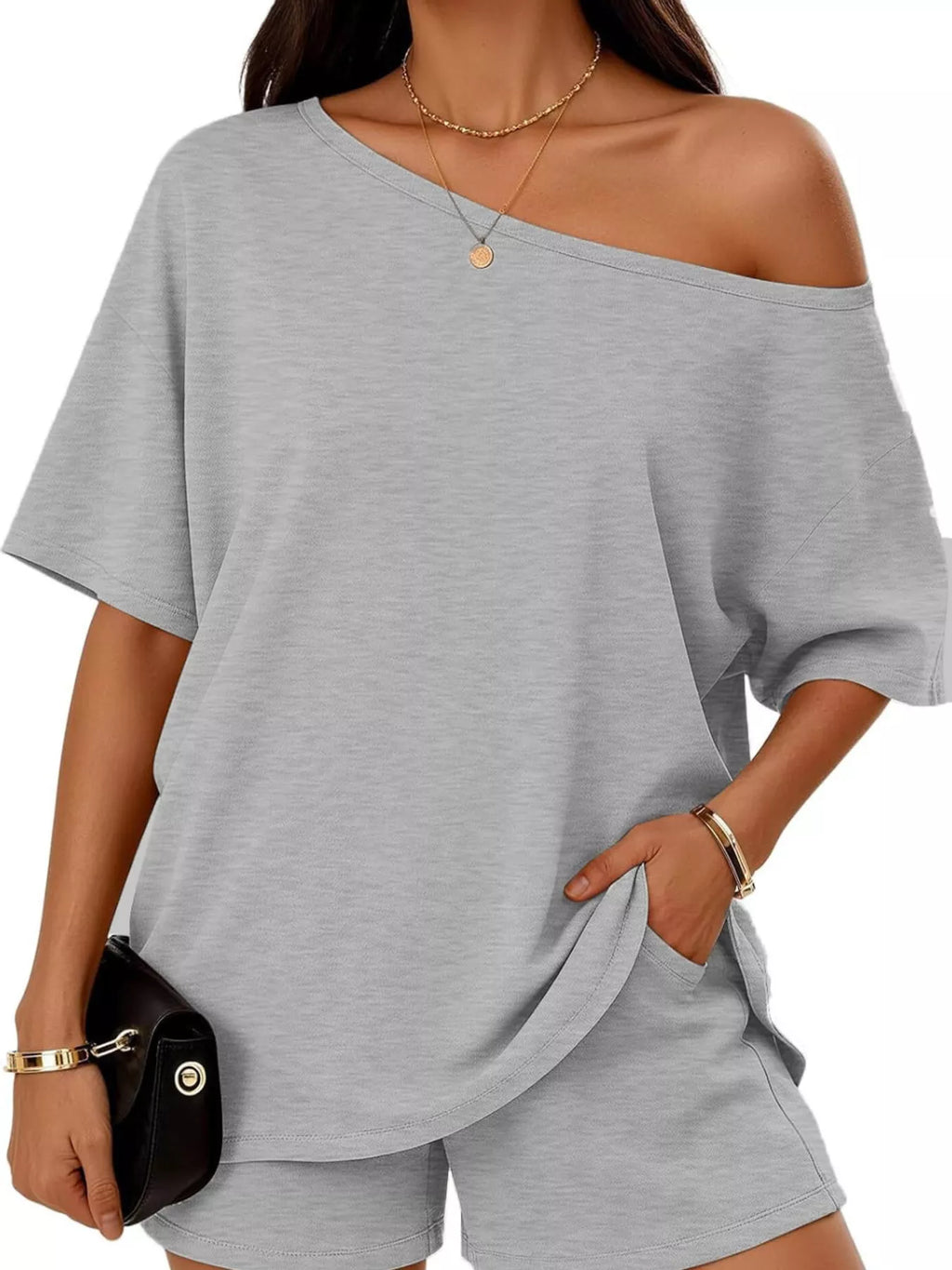 Plus size Trendsi full size one shoulder top and shorts set, featuring a stylish one-shoulder design and comfortable fit.
