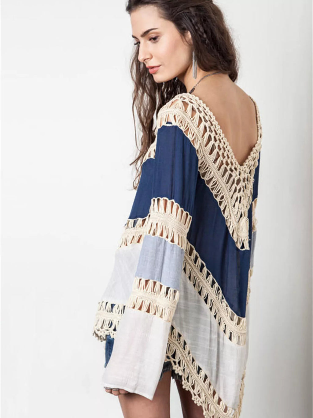 Crochet trimmed long sleeve cover-up by Trendsi featuring lightweight fabric and intricate crochet detailing.