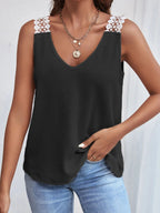 Women's V-neck waffle knit tank top with delicate lace trim, casual sleeveless top from Trendsi, shown in natural fabric detail.