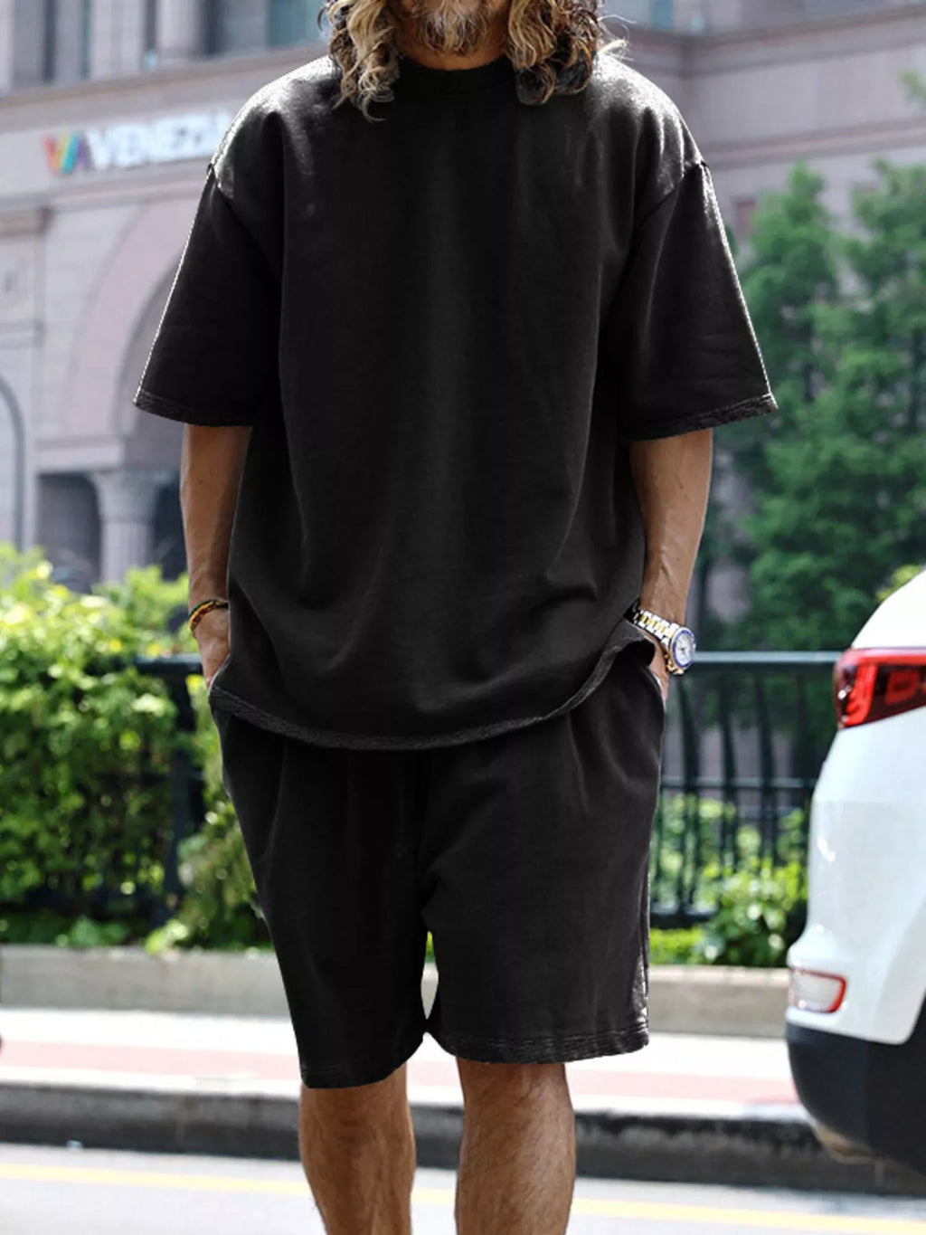 Men's relaxed fit T-shirt and shorts set in plus size by Trendsi, casual loungewear with comfortable fabric and relaxed style.