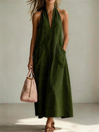 Cotton halterneck sleeveless deep V-neck casual dress by FitiqueFit with loose straight-line fit and relaxed style.