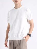 Plus size men's casual knitted short sleeve T-shirt by Trendsi, featuring a comfortable fit and soft knit fabric.