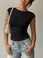 Lace detail cap-sleeve T-shirt by Trendsi, featuring soft fabric and elegant lace accents on the sleeves and neckline.