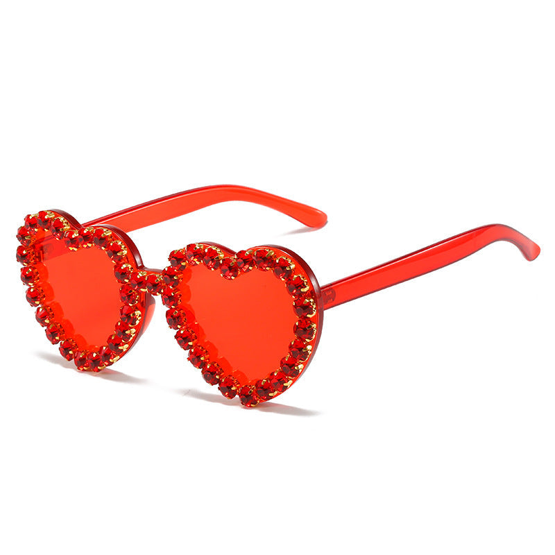 Peach heart-shaped rhinestone sunglasses by FitiqueFit, stylish Y2K INS fashion eye wear with sparkling rhinestone details.