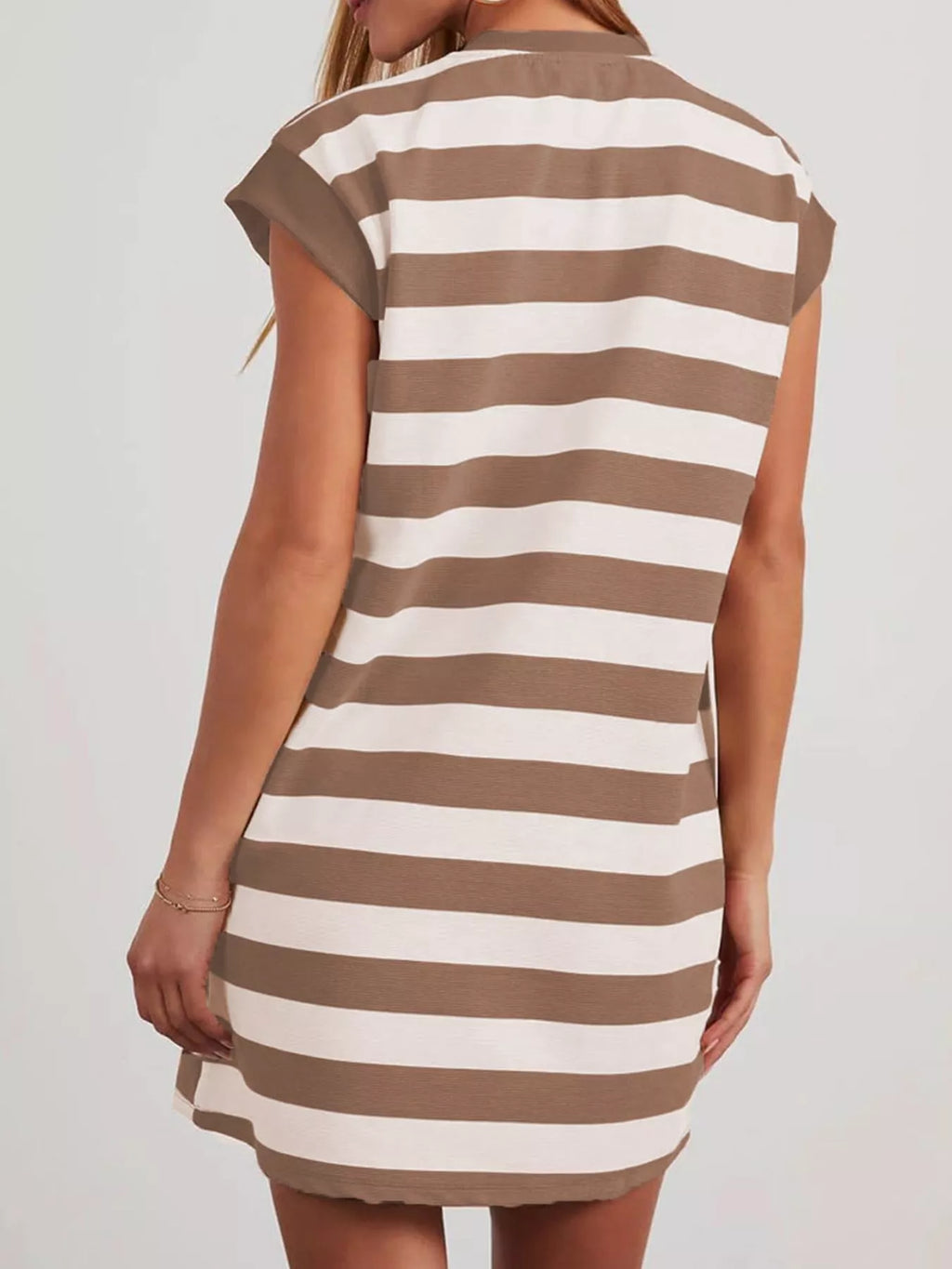 Plus size casual striped mini dress with short sleeves from Trendsi, featuring a full-length design and comfortable fit.