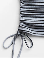 Striped crop top and wide-leg pants set by Trendsi, featuring a stylish matching dress with bold horizontal stripes.