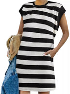 Plus size casual striped short sleeve mini dress by Trendsi, featuring a relaxed fit and vibrant horizontal stripe pattern.