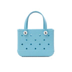 Women's waterproof EVA jelly beach bag from Plush Fashion Hub, lightweight summer tote with clear, flexible jelly material and handles.