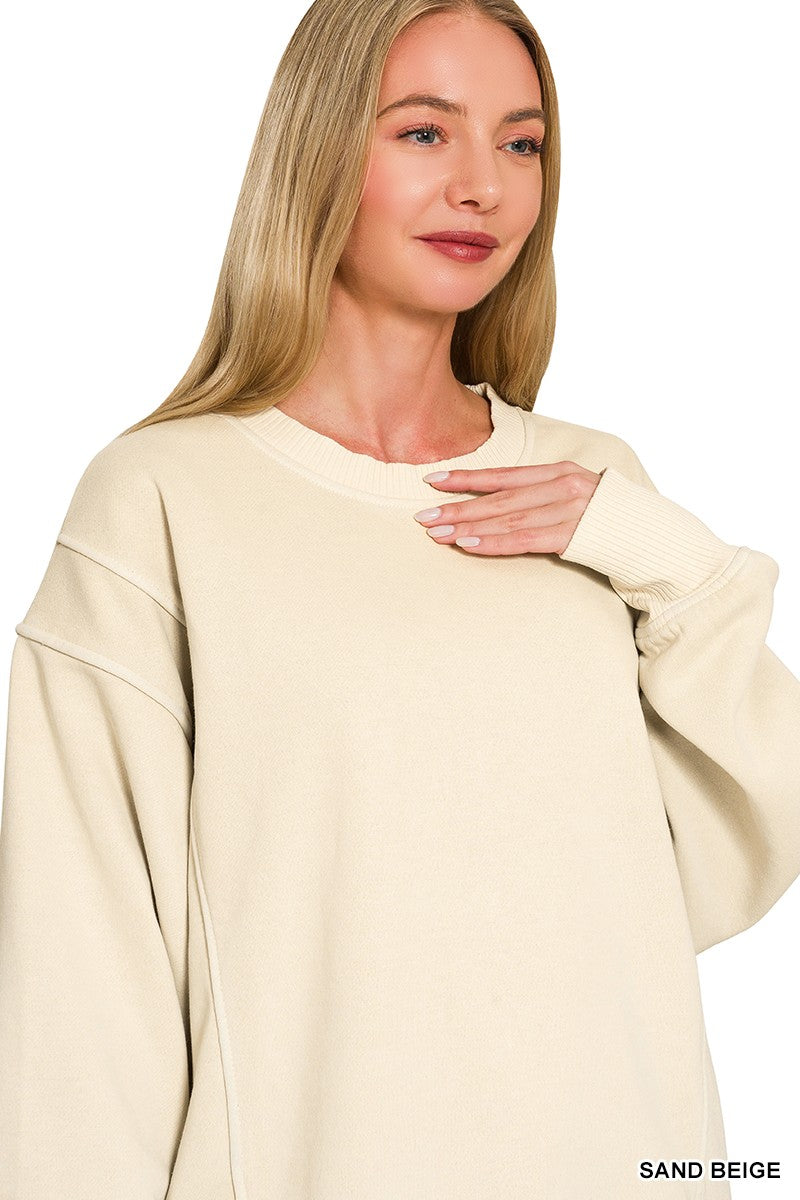 Oversized plush fashion hub pigment dye fleece crewneck sweatshirt with exposed seams, in a relaxed fit and vibrant color.